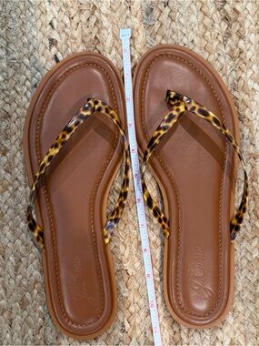 J. Crew tortoise flip flop sandals.  Only worn a couple times!  Stylish!